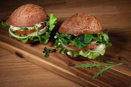 Healthy Vegan Burger. Hamburgers on a wooden table.の写真素材