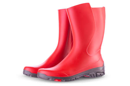 Red rubber boots isolated on white background. Outdoor shoes for trekking.の写真素材