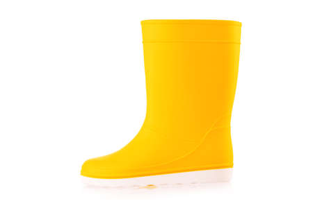 Yellow rubber boots isolated on white background. Kids shoes.の写真素材