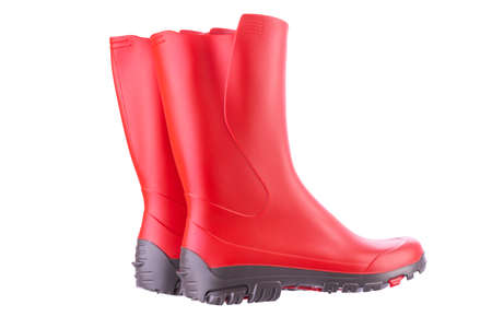 Red rubber boots isolated on white background. Outdoor shoes for trekking.の写真素材