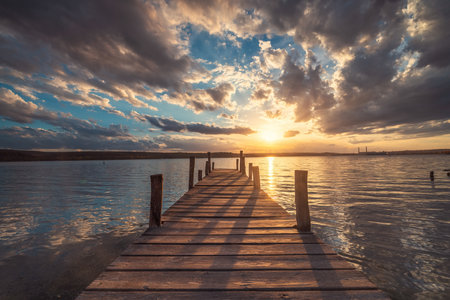 Small Dock at the lake, sunset shotの写真素材