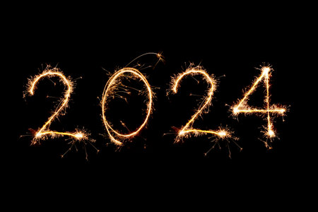 2024 written with Sparkle firework on black background, happy new year 2024 concept.の写真素材