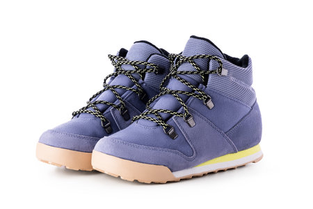 Kids Winter Shoes for outdoor sport, walking, trekking, hiking, tourism, isolated on white backgroundの写真素材