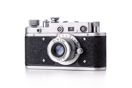 Old camera, retro photography film, vintage photo camera isolated on white backgroundの写真素材