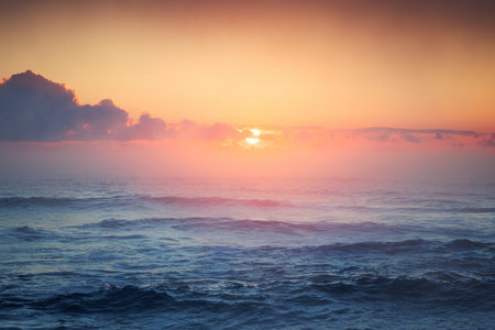 Beautiful cloudscape over the sea, sunrise shotの写真素材