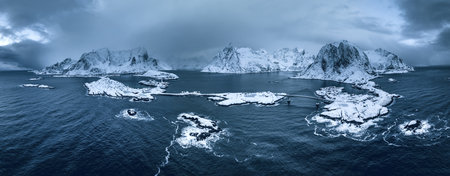 Aerial view Lofoten Islands, Norway natural landscape panorama of Fredvang Bridge, sea shores and snowy mountains peaksの写真素材