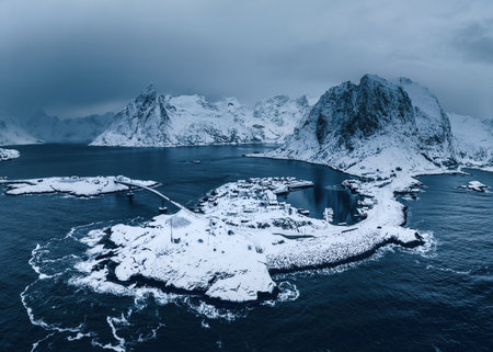 Aerial view Lofoten Islands,, Reine, Norway and Hamnoy fishing village with red rorbuer houses in winter nature panorama landscapeの写真素材
