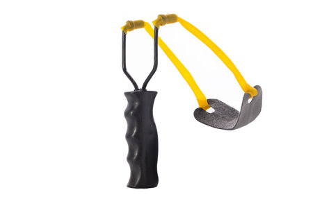 Black Handheld Slingshot with Yellow Bands Isolated on White Background