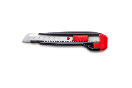 Red and Black Utility Knife with an Extendable Blade on White Backgroundの写真素材