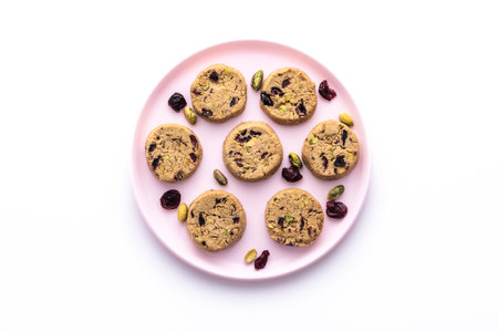 Tasty round homemade healthy biscuit made of oats, butter, nuts and dried fruitsの写真素材