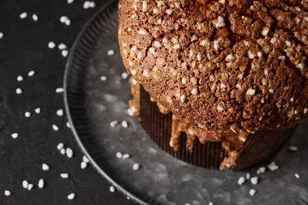 Homemade chocolate cake with sesame seeds on a dark background.の写真素材