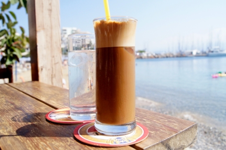 Iced coffee at a cafe in a coastal cafe                    