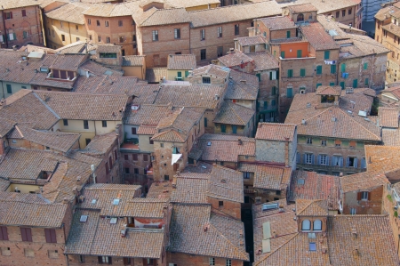Red tiled roofs of the old townの写真素材