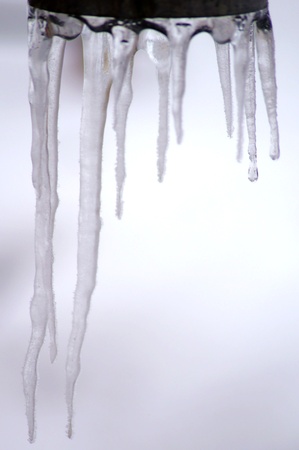 Icicles on the discharge pipeの写真素材