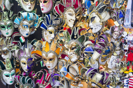 Showcase with colorful souvenir masks in Veniceの写真素材