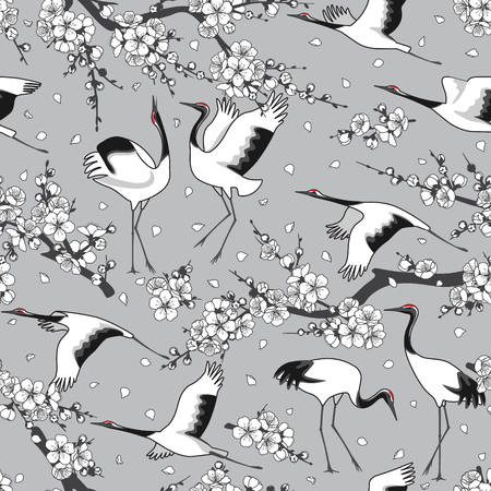 Seamless pattern with monochrome Japanese cranes, white flowering tree branches. Endless texture decoration with black and white flowers, birds and flying petals. Vector outlined illustration.のイラスト素材