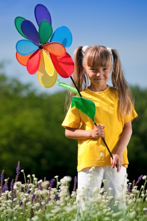 Happy  girl on meadowの写真素材