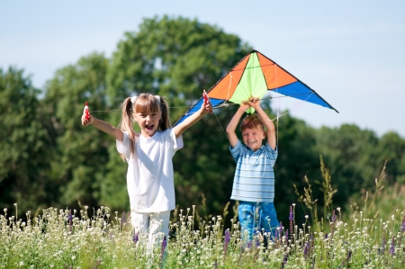 Children with kiteの写真素材