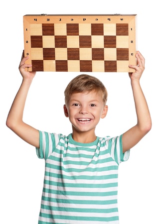 Boy with chessboardの写真素材