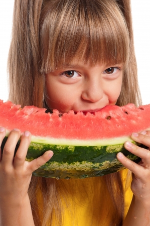 Little girl with watermelonの写真素材