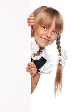 Little girl with white blankの写真素材