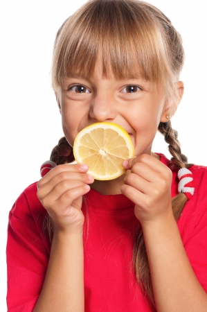 Little girl with lemonの写真素材