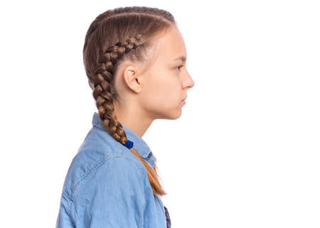 Emotional portrait of scared girl teenager, isolated on white background