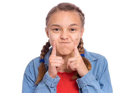 Emotional portrait of scared girl teenager, isolated on white backgroundの写真素材