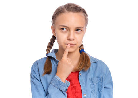 Emotional portrait of scared girl teenager, isolated on white backgroundの写真素材