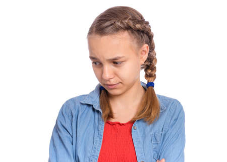 Emotional portrait of scared girl teenager, isolated on white backgroundの写真素材