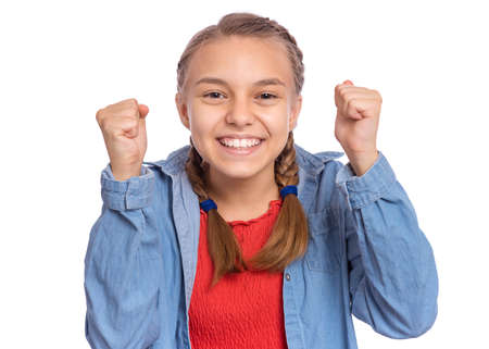 Happy teenage girl laughing looking very happy, isolated on white backgroundの写真素材