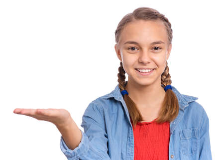 Happy teenage girl laughing looking very happy, isolated on white backgroundの写真素材