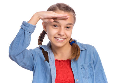 Happy teenage girl laughing looking very happy, isolated on white backgroundの写真素材
