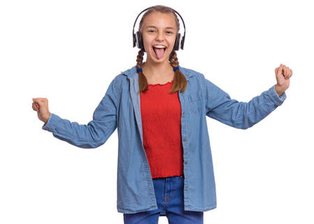 Beautiful teenage girl with headphones, isolated on white backgroundの写真素材