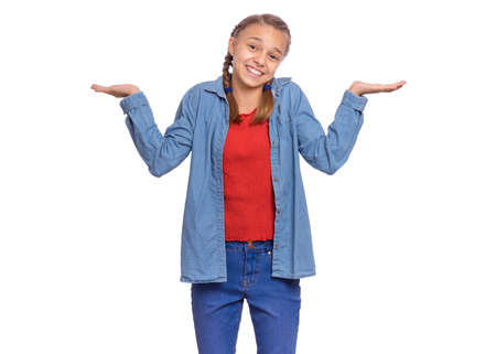 Happy teenage girl laughing looking very happy, isolated on white backgroundの写真素材