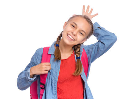 Happy teenage girl laughing looking very happy, isolated on white backgroundの写真素材