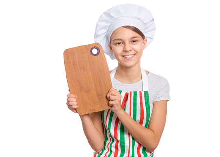 Cute girl in chef uniform isolated on white background showing menu blackboard and Perfect hand signの写真素材