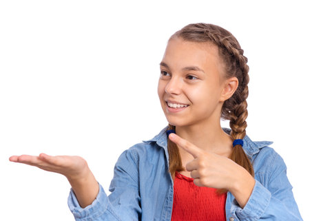 Happy teenage girl laughing looking very happy, isolated on white backgroundの写真素材