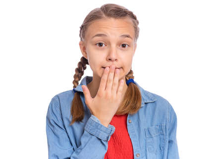 Emotional portrait of scared girl teenager, isolated on white backgroundの写真素材