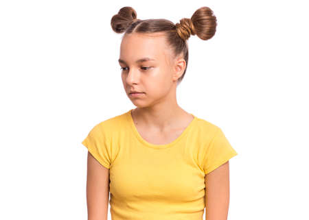 Emotional portrait of scared girl teenager, isolated on white backgroundの写真素材