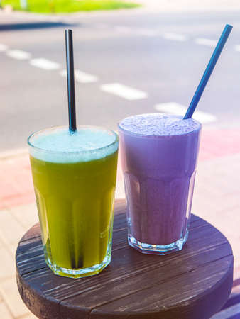 Blueberry cocktail and fruit lemonade out of doors. Refreshing drinks in the outdoor cafeの写真素材