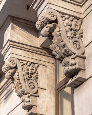 decorative elements on the Windows of the building facade.