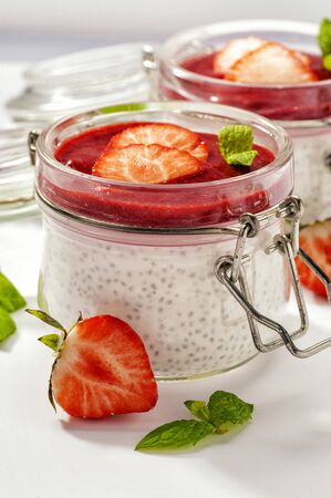 Chia pudding with raspberries. Close up and vertical orientation. 
の写真素材