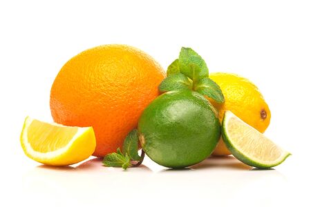 Fresh citrus fruits. Healthy eating concept. Orange, lemon and lime isolated on a white background. Close-up.の写真素材