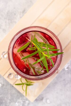 Summer refreshing cocktails made of rose wine or gin with raspberries and rosemary. Close-up. Top view. の写真素材
