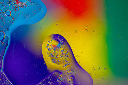 Abstract colored background close-up. Template for design. Soft flowing shape from different colors....