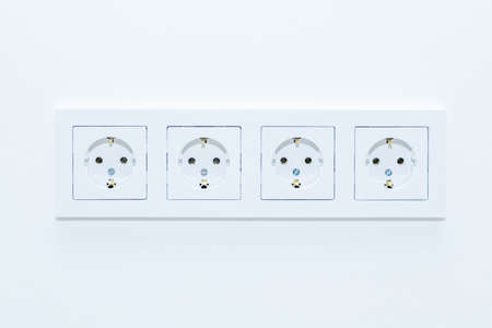 Wall-mounted electrical outlet. Close-up. Selective focus.の写真素材