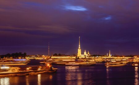 Russia, Saint-Petersburg, June 2, 2019: The Admiralty Building at night, night illumination, traffic boats.のeditorial素材
