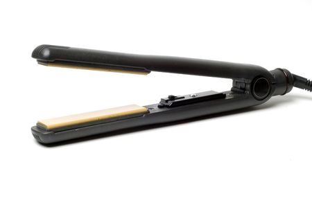 Pair of hair straighteners on a white backgroundの写真素材