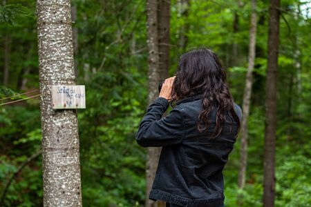 Diverse people enjoy spiritual gathering A professional male photographer with long black hair is...